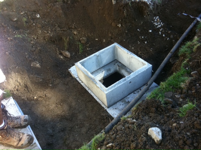 Riser and 1/3 slab lid installed on older tank